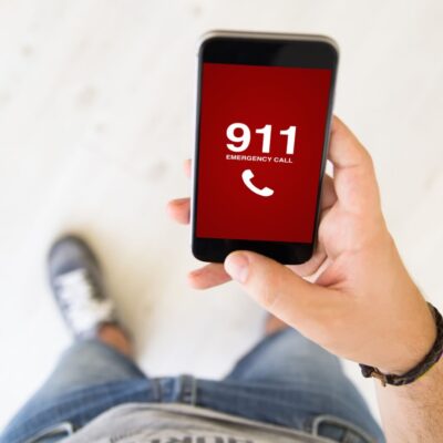 Man using his mobile phone to call 911